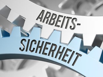 Arbeitssicherheit Zahnräder mit den Worten „Arbeitssicherheit“ in dunkler und heller Farbe.